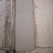 Grubopowłokowy materiał Belzona 4141 (Magma-Build) zastosowany na powierzchni pionowej